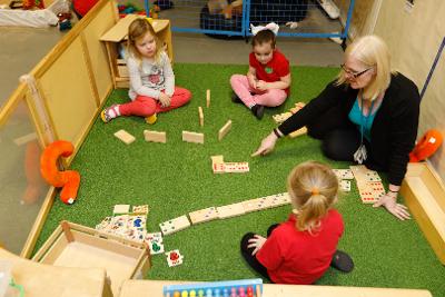 Early years staff with pupils